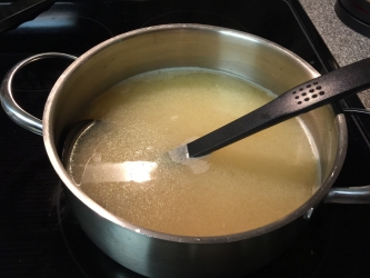 <p>Bring broth and wine to simmer. I used Pinot Grigio.</p>